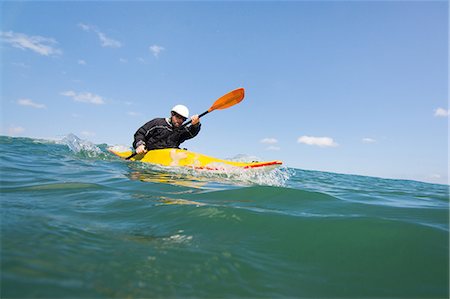 Man paddling kayak at sea, Las Huacas, Guanacaste, Costa Rica, Central America Stock Photo - Premium Royalty-Free, Code: 614-08946538