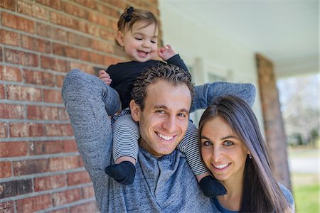 Parents and daughter outdoors Stock Photo - Premium Royalty-Free, Code: 614-08946581