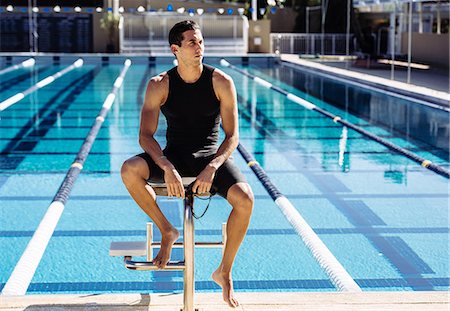 simsearch:614-08870825,k - Swimmer sitting at end of pool Stock Photo - Premium Royalty-Free, Code: 614-08983499