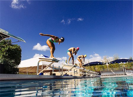 simsearch:614-08870825,k - Swimmers on pool diving board Stock Photo - Premium Royalty-Free, Code: 614-08983529