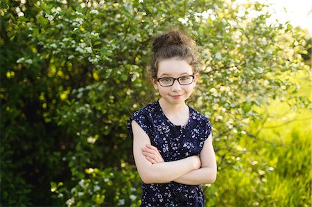 simsearch:614-08983611,k - Portrait of girl wearing eye glasses in field with blossoming trees Stockbilder - Premium RF Lizenzfrei, Bildnummer: 614-08983586