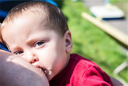 Baby boy breast feeding Stock Photo - Premium Royalty-Free, Code: 614-08983834
