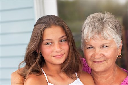 Grandmother and grandchild hugging Stock Photo - Premium Royalty-Free, Code: 614-08990685