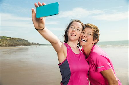 simsearch:614-08031039,k - Mother and daughter taking selfie on beach, Folkestone, UK Stock Photo - Premium Royalty-Free, Code: 614-08991220