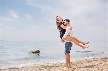 simsearch:614-00808302,k - Couple on beach, Odessa, Ukraine Fotografie stock - Premium Royalty-Free, Codice: 614-09017273