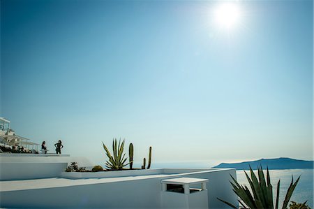 View across rooftops of buildings, O'a, Santorini, Kikladhes, Greece Stock Photo - Premium Royalty-Free, Code: 614-09017802