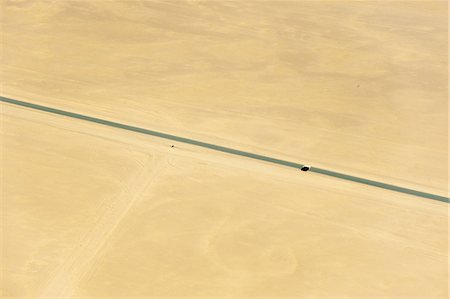 Aerial view of road in the Namib Desert, Namibia Stock Photo - Premium Royalty-Free, Code: 614-09017959
