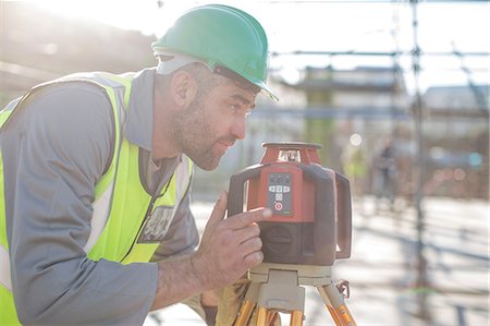simsearch:614-06895837,k - Construction worker using surveying equipment Stock Photo - Premium Royalty-Free, Code: 614-09026620