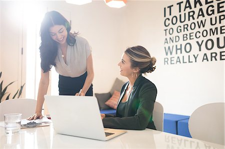 simsearch:614-06442777,k - Two young businesswomen meeting in creative office Stock Photo - Premium Royalty-Free, Code: 614-09026821