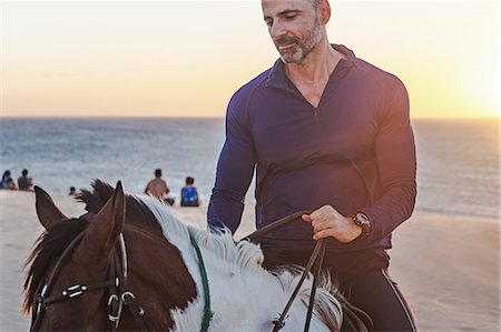 simsearch:614-09027173,k - Man riding horse on beach, Jericoacoara, Ceara, Brazil, South America Foto de stock - Sin royalties Premium, Código: 614-09026898