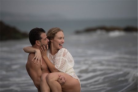 evening dress on beach - Romantic couple on beach, Malibu, California, US Stock Photo - Premium Royalty-Free, Code: 614-09039064