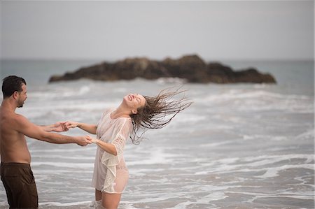 evening dress on beach - Romantic couple on beach, Malibu, California, US Stock Photo - Premium Royalty-Free, Code: 614-09039065