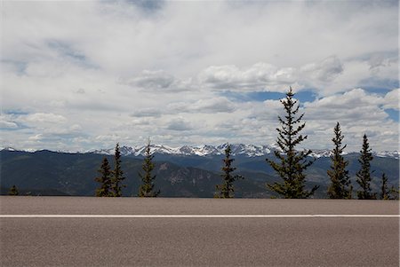 Squaw Pass highway and distant mountains, Evergreen, Colorado, USA Stock Photo - Premium Royalty-Free, Code: 614-09039076