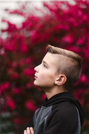 simsearch:614-09056681,k - Profile portrait of boy looking away Fotografie stock - Premium Royalty-Free, Codice: 614-09056688