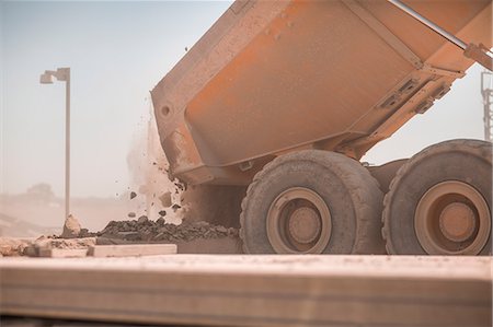 quarry nobody - Dump truck in quarry, tipping load of stones Stock Photo - Premium Royalty-Free, Code: 614-09056781