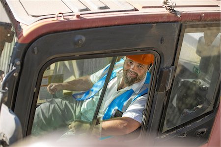 Quarry worker, operating heavy machinery Foto de stock - Sin royalties Premium, Código: 614-09056795