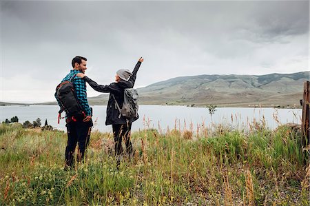 Couple hiking, standing beside Dillon Reservoir,  Silverthorne, Colorado, USA Stock Photo - Premium Royalty-Free, Code: 614-09127202