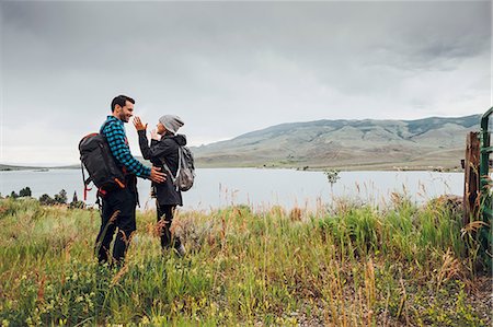 simsearch:614-09127185,k - Couple hiking, standing beside Dillon Reservoir, face to face, Silverthorne, Colorado, USA Stock Photo - Premium Royalty-Free, Code: 614-09127203