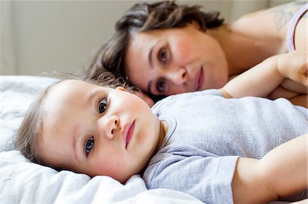 simsearch:649-09139262,k - Portrait of mother and baby daughter, relaxing on bed Stock Photo - Premium Royalty-Free, Code: 614-09127370