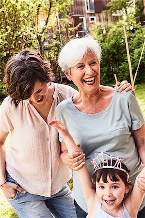 simsearch:614-09127392,k - Portrait of senior woman with grown daughter and granddaughter, outdoors, laughing Stock Photo - Premium Royalty-Free, Code: 614-09127419