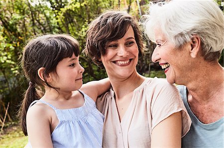 simsearch:614-09127392,k - Portrait of senior woman with grown daughter and granddaughter, outdoors, smiling Stock Photo - Premium Royalty-Free, Code: 614-09127420