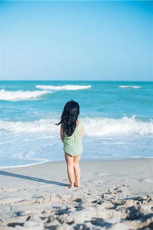 Little girl on beach Stock Photo - Premium Royalty-Free, Code: 614-09156818