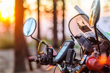 simsearch:649-09166665,k - Windshield and controls of touring motorcycle at sunset, close up, Yosemite National Park, California, USA Stock Photo - Premium Royalty-Free, Code: 614-09159604