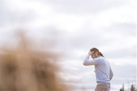 simsearch:614-06718457,k - Man gardening with hand on forehead Stock Photo - Premium Royalty-Free, Code: 614-09159624