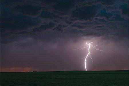 flat landscape - Forked cloud-to-ground lightning bolt hits rural terrain, Ogallala, Nebraska, US Stock Photo - Premium Royalty-Free, Code: 614-09168138