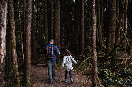 simsearch:614-09178141,k - Father and daughter hiking in forest, Tofino, Canada Stock Photo - Premium Royalty-Free, Code: 614-09178107