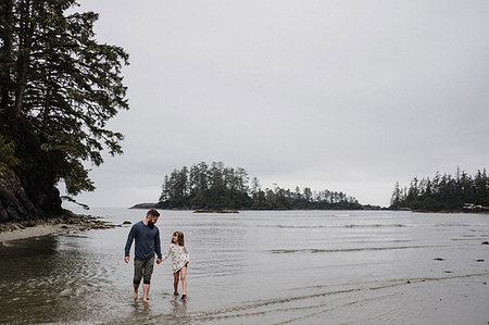 Father and daughter on beach, Tofino, Canada Stock Photo - Premium Royalty-Free, Code: 614-09178119