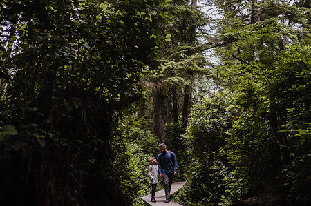 simsearch:614-09178141,k - Father and daughter hiking in forest, Tofino, Canada Stock Photo - Premium Royalty-Free, Code: 614-09178112