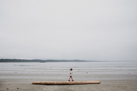 Girl on beach, Tofino, Canada Stock Photo - Premium Royalty-Free, Code: 614-09178120