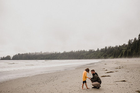 Father and daughter on beach, Tofino, Canada Stock Photo - Premium Royalty-Free, Code: 614-09178144