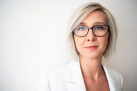 eyeglasses closeup - Portrait of businesswoman Stock Photo - Premium Royalty-Free, Code: 614-09183082