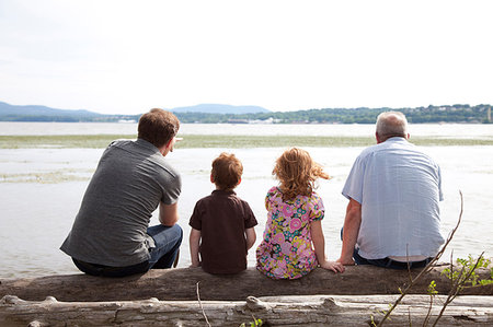 Children by river with father and grandfather Stock Photo - Premium Royalty-Free, Code: 614-09210069