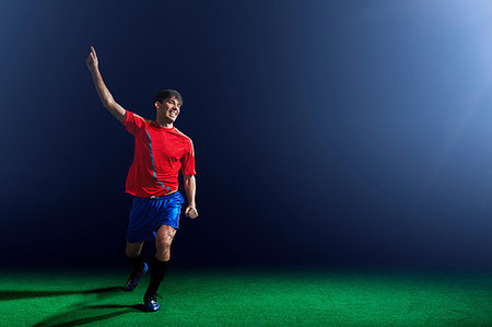 simsearch:6116-07236122,k - Male soccer player celebrating Stock Photo - Premium Royalty-Free, Code: 614-09210345