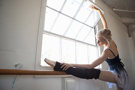 Ballet dancer practising in studio Stock Photo - Premium Royalty-Free, Code: 614-09210521
