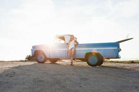 freedom teen blond beach - Portrait of young female surfer leaning against pickup truck at beach, Encinitas, California, USA Stock Photo - Premium Royalty-Free, Code: 614-09211325