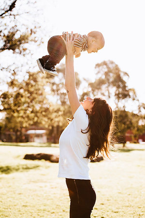 simsearch:614-09211363,k - Mother swinging son in air Stock Photo - Premium Royalty-Free, Code: 614-09211379