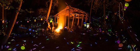 Panoramic of young people partying with glow sticks at night, Okanagan Valley, Naramata, British Columbia, Canada Stock Photo - Premium Royalty-Free, Code: 614-09211498
