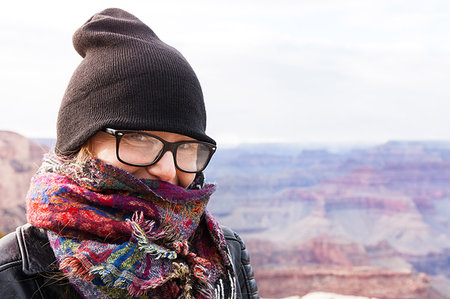 Woman wearing hat and scarf, Grand Canyon, Arizona, USA Stock Photo - Premium Royalty-Free, Code: 614-09211614