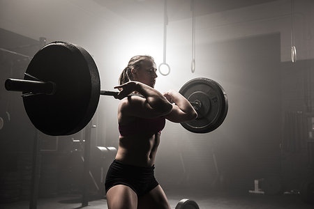 simsearch:614-08877527,k - Young woman lifting barbell Stock Photo - Premium Royalty-Free, Code: 614-09211934