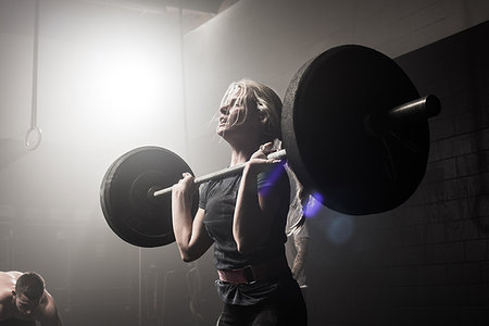 simsearch:614-08877527,k - Young woman lifting barbell Stock Photo - Premium Royalty-Free, Code: 614-09211936