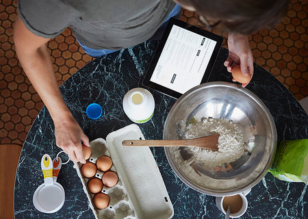 Woman baking in kitchen Stock Photo - Premium Royalty-Free, Code: 614-09212198