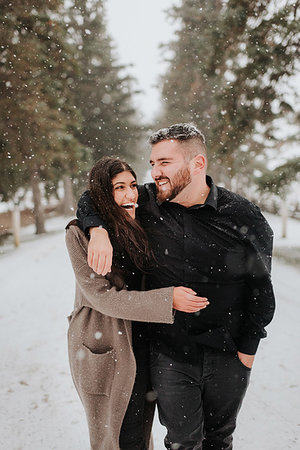 rural towns in canada - Couple walking in snowy landscape, Georgetown, Canada Stock Photo - Premium Royalty-Free, Code: 614-09232014