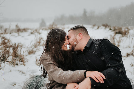 rural towns in canada - Couple kissing in snow, Georgetown, Canada Stock Photo - Premium Royalty-Free, Code: 614-09232015