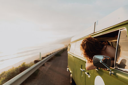 driving away to freedom - Man on van road trip on coastal road, Ventura, California, US Stock Photo - Premium Royalty-Free, Code: 614-09232031