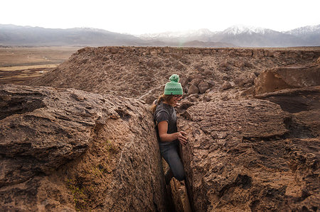 Climber stuck in offwidth crack, Sierra Nevada, Bishop, California, USA Foto de stock - Sin royalties Premium, Código: 614-09245206