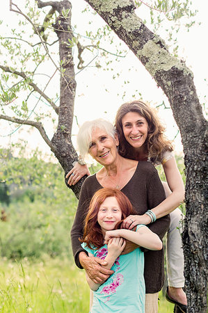 simsearch:614-09127392,k - Girl by garden tree with mother and grandmother, portrait Stock Photo - Premium Royalty-Free, Code: 614-09245261